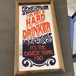 Bar sign. I’m not a hard drinker. It’s the easiest thing I do.